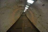 Netradiční kratochvíle v podobě pěšího průchodu tunelem pod řekou Temží.